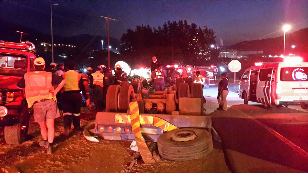 Two dead, two injured when truck overturns