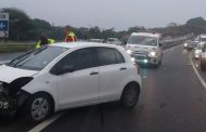 Woman injured as car slams into barrier in wet weather