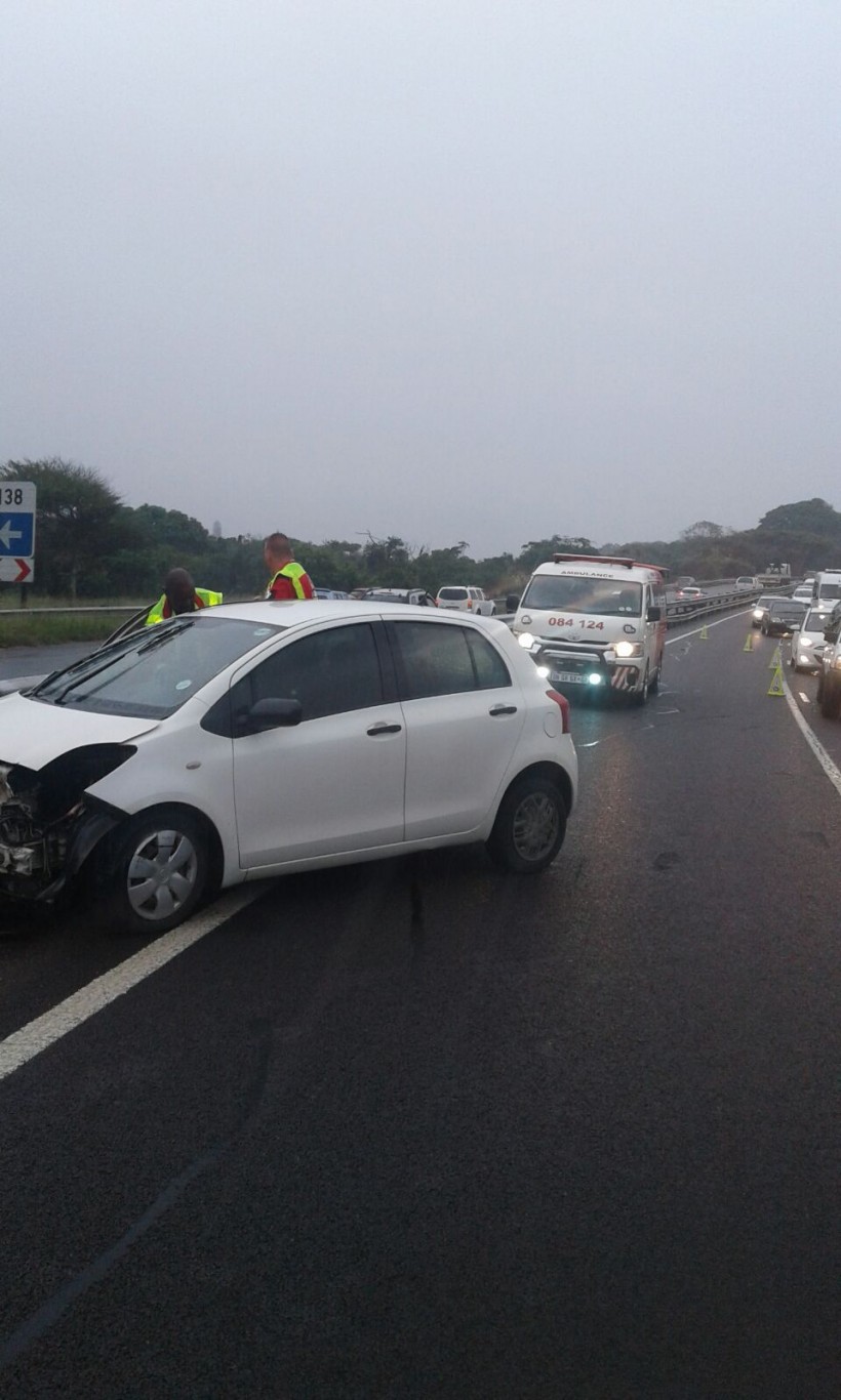 Woman injured as car slams into barrier in wet weather