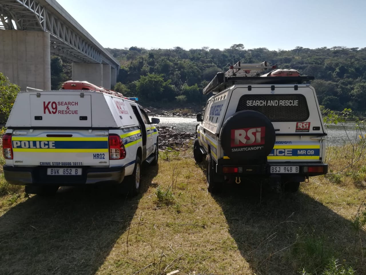 Members of Search and Rescue Unit search for murder victim in the Tugela river