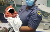 Brave police officers hailed for assisting a woman give birth at the gate of a police station