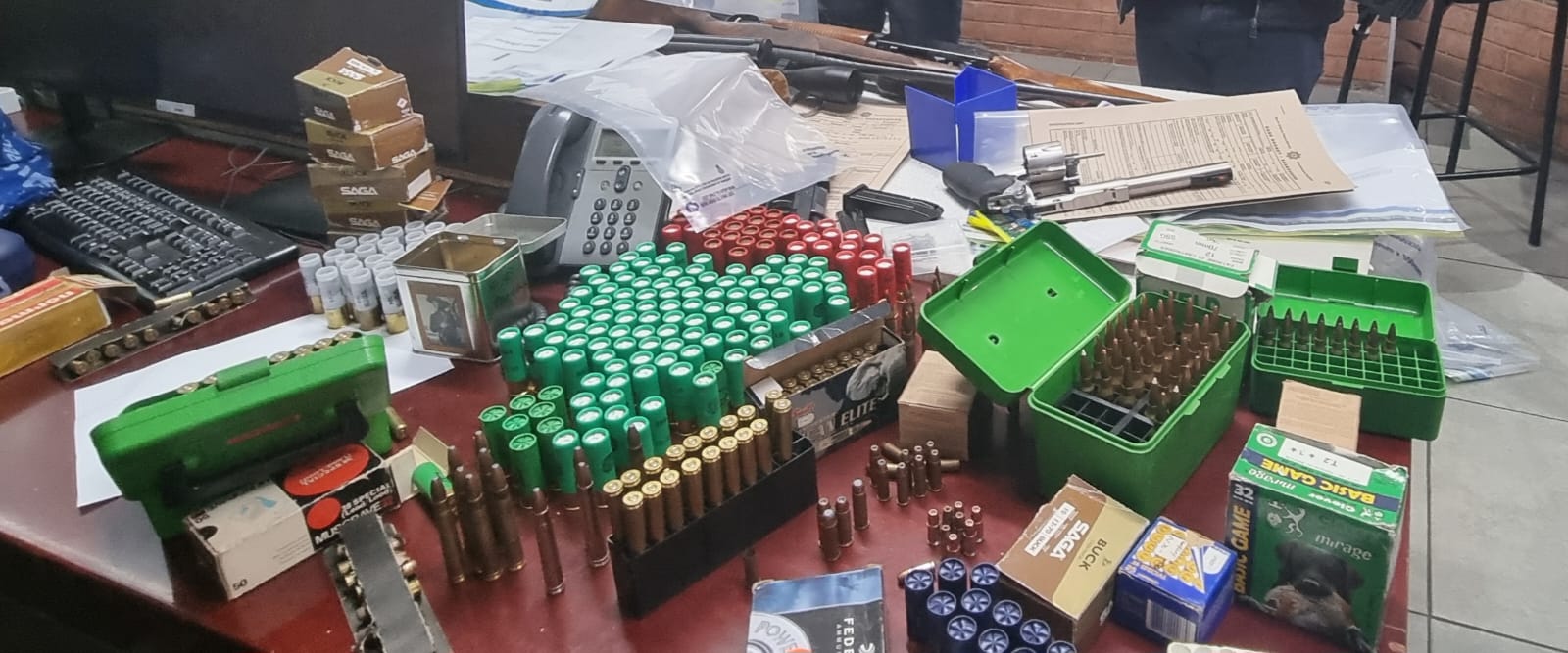 Nine unlicensed firearms and 617 rounds of ammunition confiscated