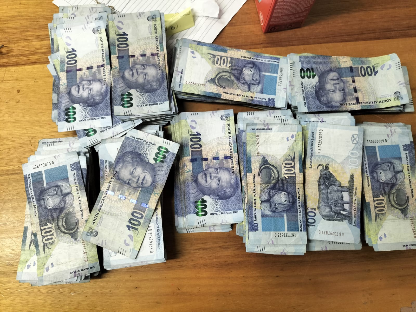 Multi-discipline task team arrests business robbers