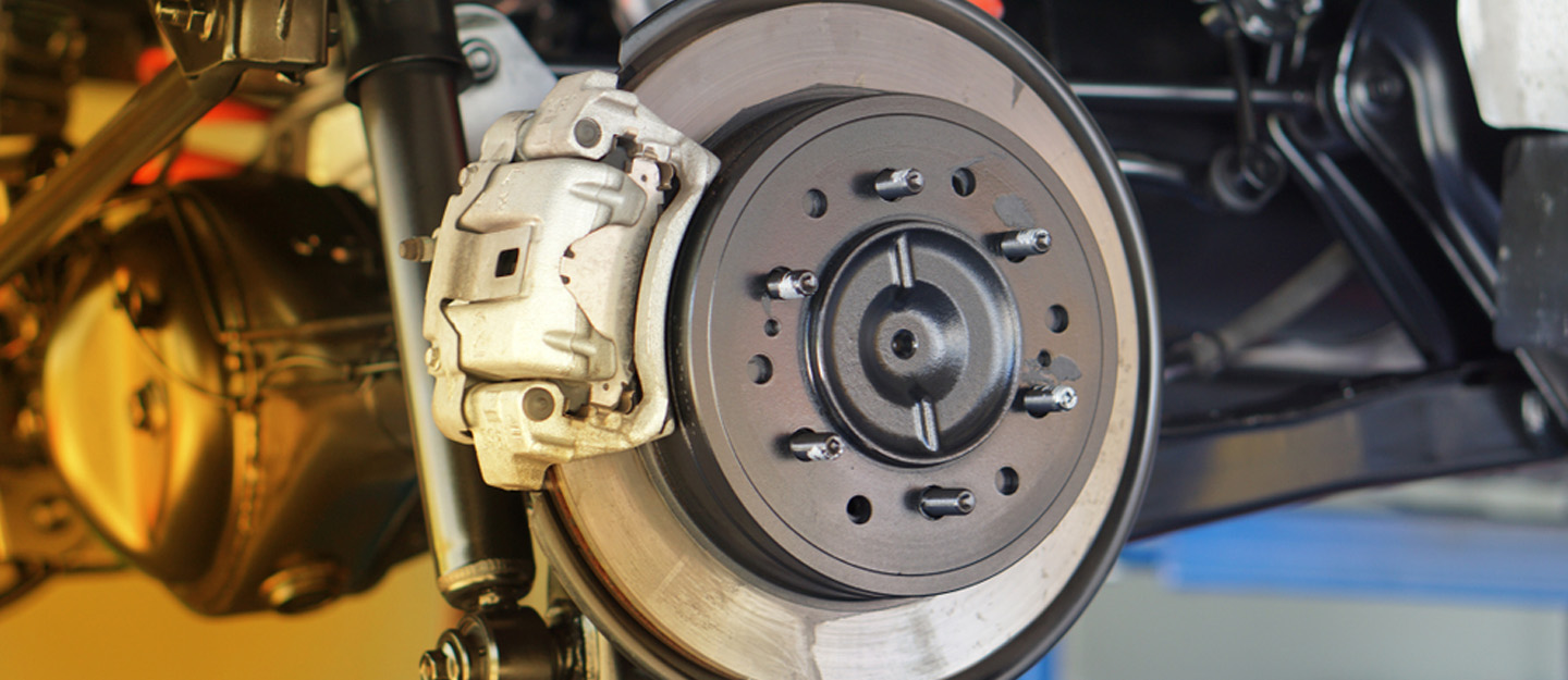 How does the temperature affect car braking system components?
