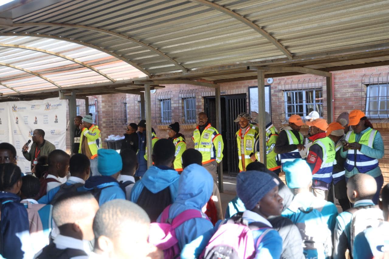 Traffic officials engage with grade 10 learners at Siyabonga Secondary School in Braamfisher Ville