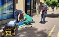 Emergency services are currently treating a man who fell out of a window at a building in Oudtshoorn