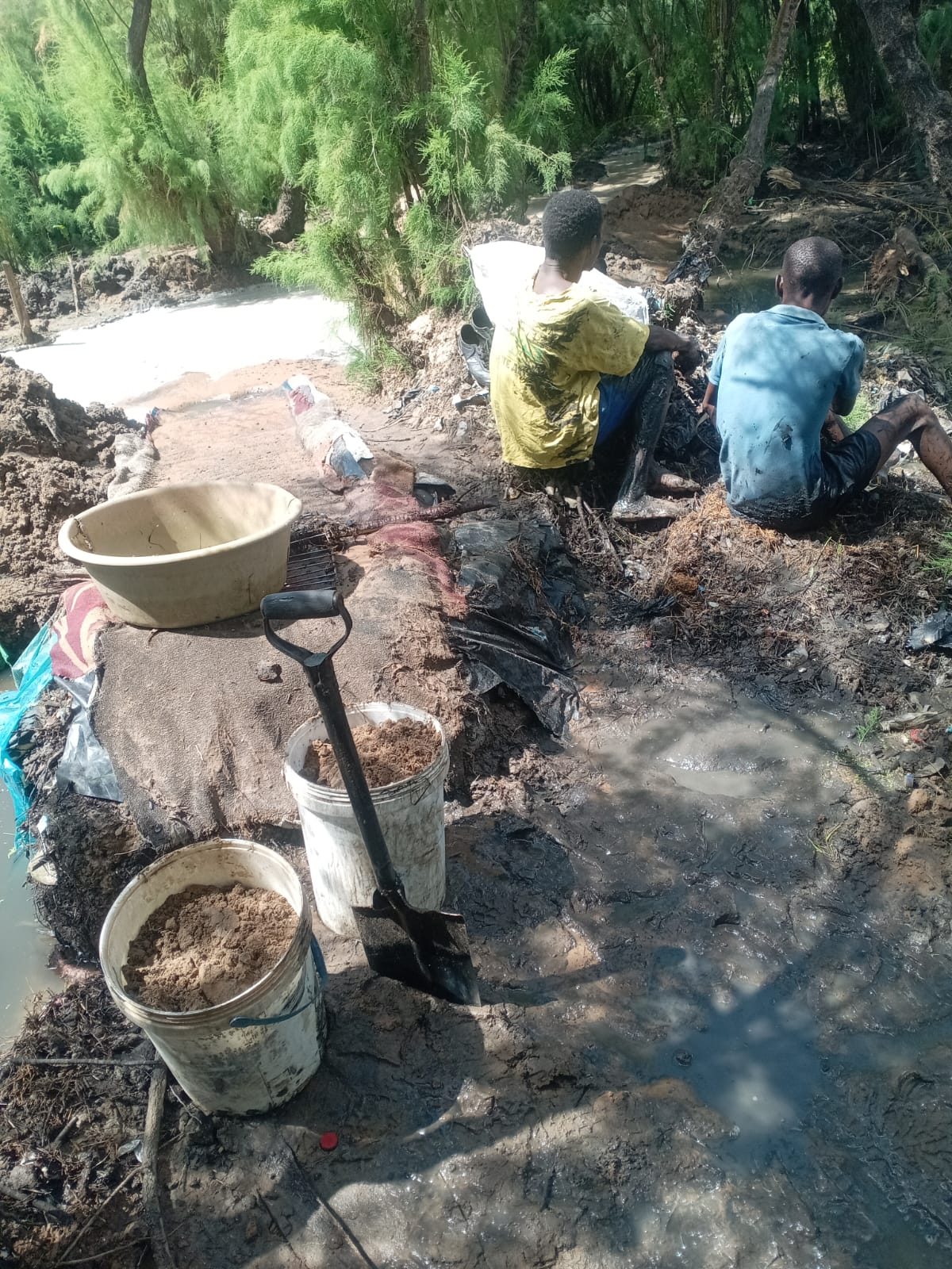 Gold-bearing material and processing equipment seized and more illegal underground miners arrested in possession of explosives and drugs